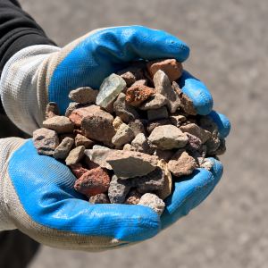 20mm Recycled Aggregate held in blue and white gloves