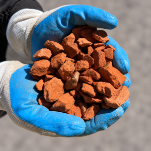20mm Crushed Terracotta held in blue and white gloves